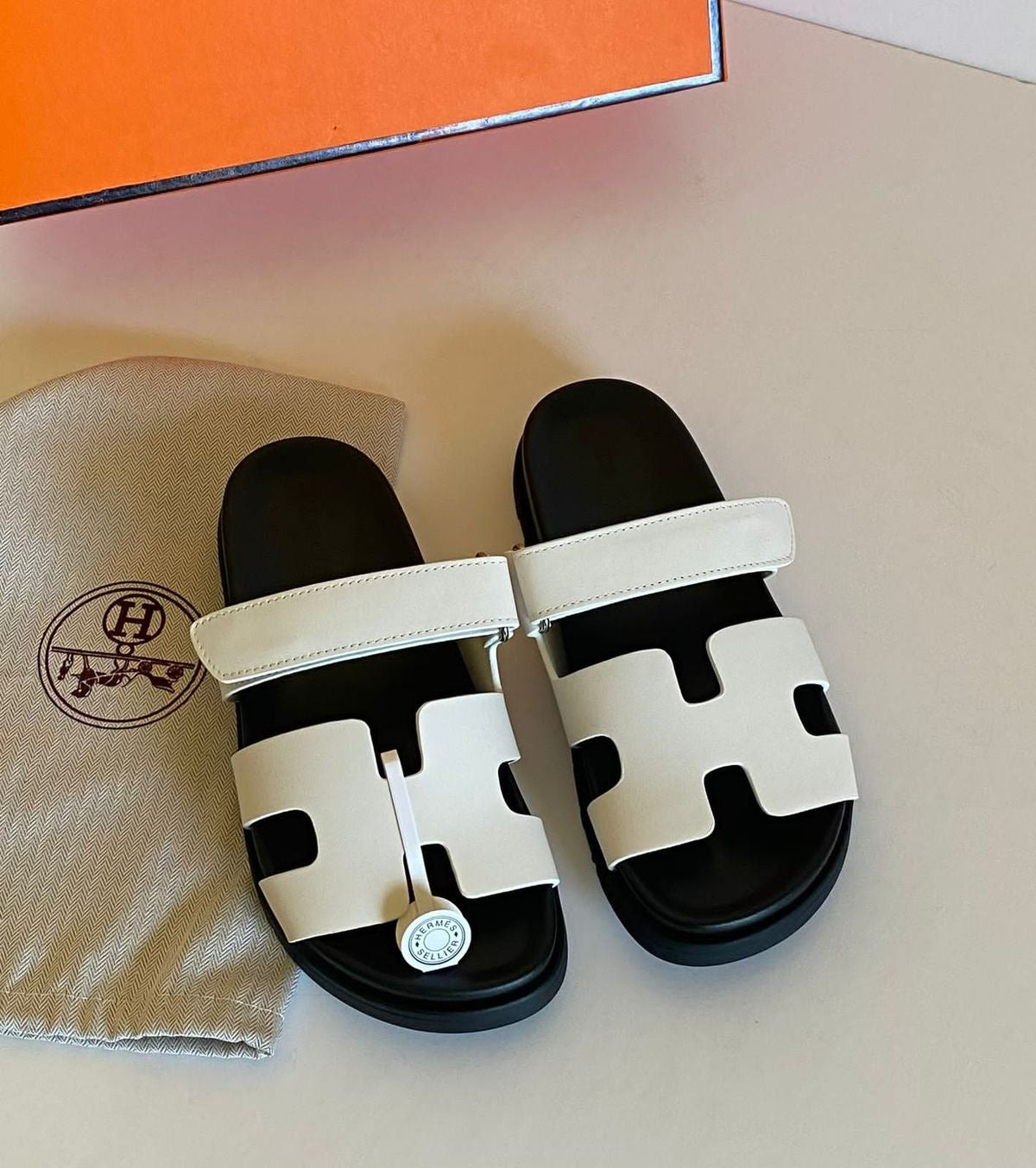 Hermès Chypre Sandals – White & Black Sole