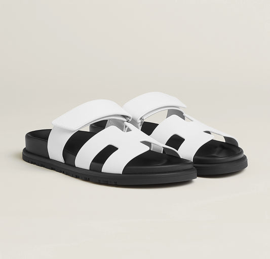 Hermès Chypre Sandals – White & Black Sole