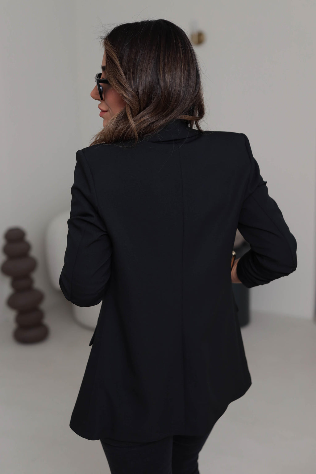 Black buttonless blazer