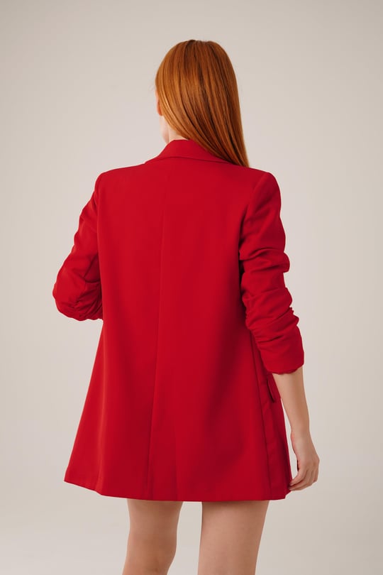 Red buttonless blazer