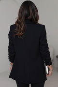 Black buttonless blazer